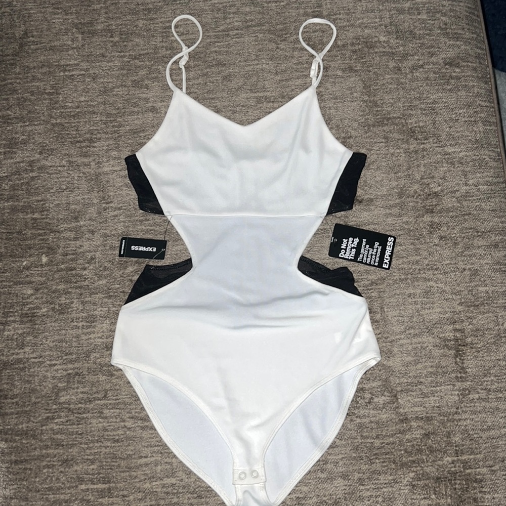 Black mesh and white cutout body suit with gold zipper on back